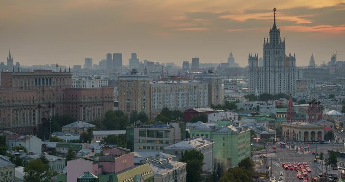 View of Taganskaya Square and the high-rise building on Kotelnicheskaya embankment, turning on street lighting