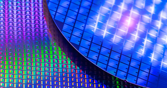 Silicon wafer for manufacturing semiconductor of integrated circuit.Electronic circuit designs have been built onto the wafers using micromaching including photolithography