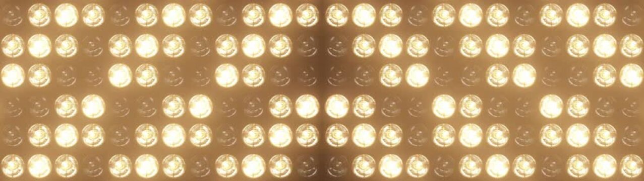 Widescreen flashing lights with bright warm lamps pulsing in patterns, perfect for music videos, club events, and show intros, concert visuals and dynamic stage backgrounds	
