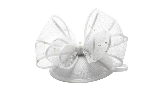 White fascinator hat with large bow and scattered glitter accents isolated on a transparent background