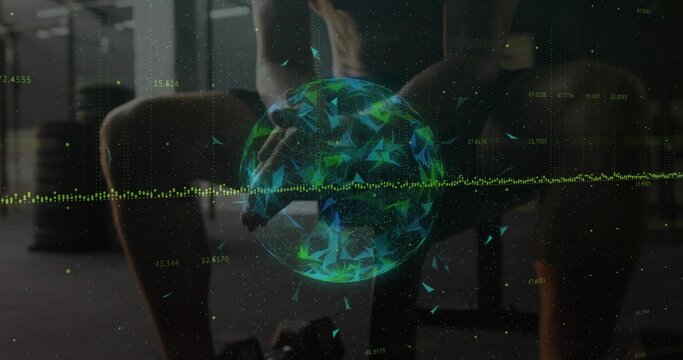 Doing bent-over exercise, mid-adult male in dark shorts and tank top in gym, with holographic globe