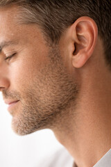 Fototapeta premium Close-up of a man with well-groomed facial hair and profile view