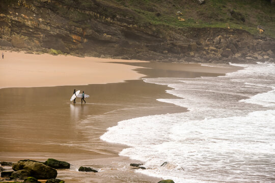 Surfer or bodyboarder on the beaches of Cantabria in Spain.