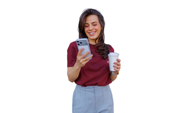 Young woman smiling, enjoying coffee to go while using smartphone for social media or messaging, transparent background