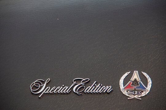 Tehran, Iran - February 18, 2017 - the arm and logo of 1972 Dodge Charger SE on the black dashboard