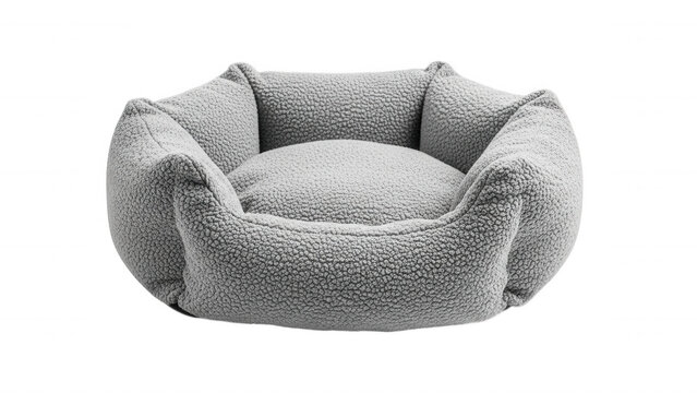 Plush grey pet bed with raised sides and cushioned center isolated on a transparent background