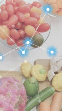 Vertical video: Camera panning down, glowing overlay linking tomato, squash, garlic to map produce