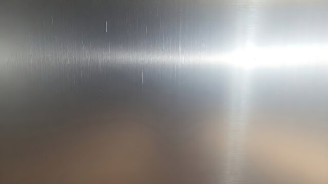 A metal surface shifts from rough matte to glossy finish with visible light reflections, intended for precision metalworking safety and maintenance materials.