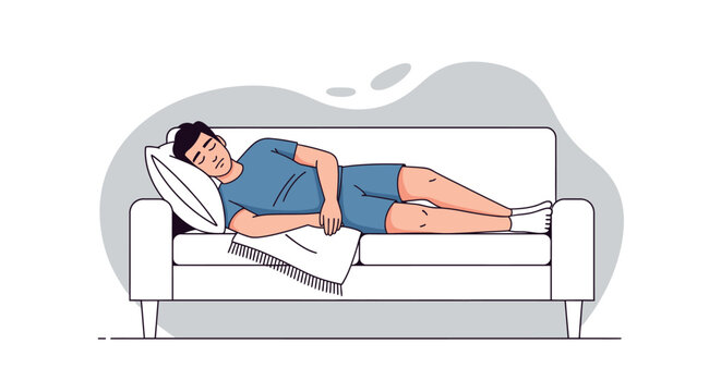 Man lying on a couch sleeping.