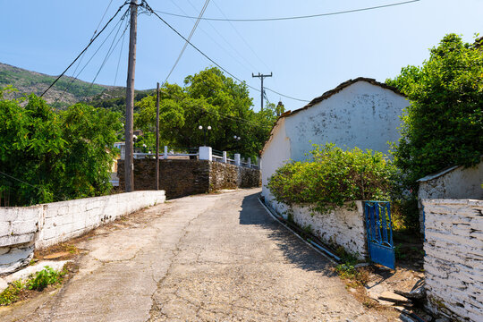 Arethousa, Ikaria Greece small Greek mountain village street with residential home house buildings in summer longevity blue zone
