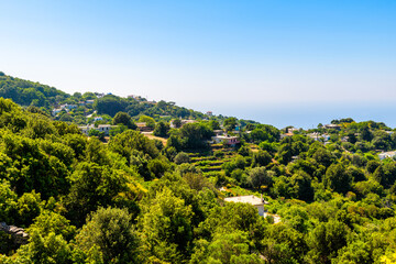 Obraz premium Perdiki mountain village on Ikaria island, Greece cityscape of small town with houses homes cityscape garden at longevity blue zone