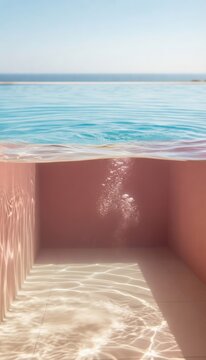 Rose pink underwater pool environment below a blue water surface at a luxury hotel for resort lifestyle branding, aquatic editorial and travel agency advertising