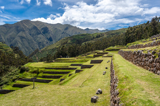 Inca archaeological site of Chinchero with terraces and mountain backdrop