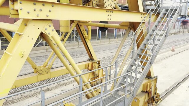 big construction in sea port moved at berth for discharge wheat in bulk from the cargo ship holds. electrical vacuum equipment which reduce pollution. green technology.