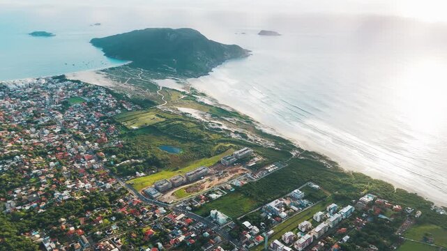 Aerial view of the Santinho beach during sunrise on the island of Santa Catarina. Florianopolis, Brazil