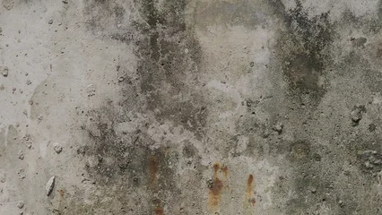 Fotobehang Stenen muur Weathered and stained old concrete wall texture with rust spots  © RilakkuMaxx
