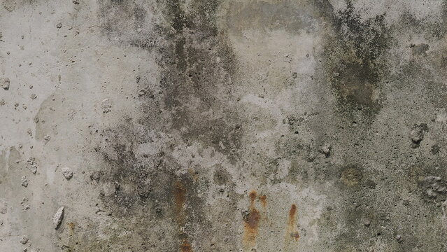Weathered and stained old concrete wall texture with rust spots