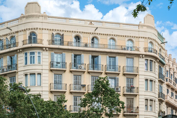 Obraz premium Classic Residential Building Facade Barcelona With Balconies And Shutters, Mediterranean Style