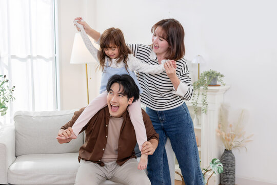 Family sharing joyful moments together in living room