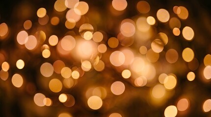 Obraz premium Abstract golden bokeh lights background. Festive, celebrating, and warm feeling.