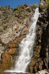 Obraz premium Medvezhiy (Bear) Waterfall in the lush green Turgen Gorge, Almaty region, Kazakhstan