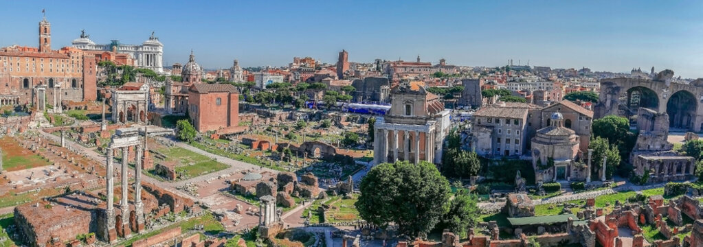 ROME, ITALY - MAY 31, 2017: Panoramic view over the ruins of the Roman Forum with the Monument Nazional a Vittorio Emanuele II in the background. Rome, Italy.