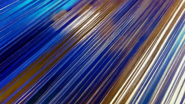Abstract lines of blue and gold create a dynamic, flowing pattern. This vibrant background suggests digital data or energy movement.