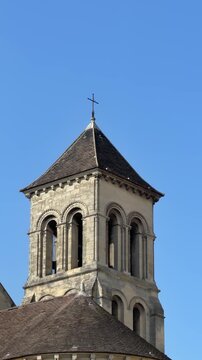 Detailed closeup of historic stone church in bright sunlight