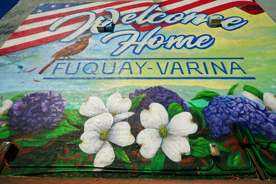 Fuquay-Varina, NC - USA - 12-24-2025: Welcome Home mural by artist JP Jermaine Powell in downtown Fuquay-Varina, North Carolina