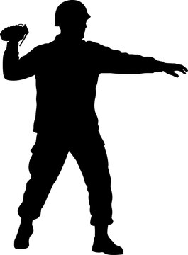 Silhouette of a combatant throwing an explosive grenade