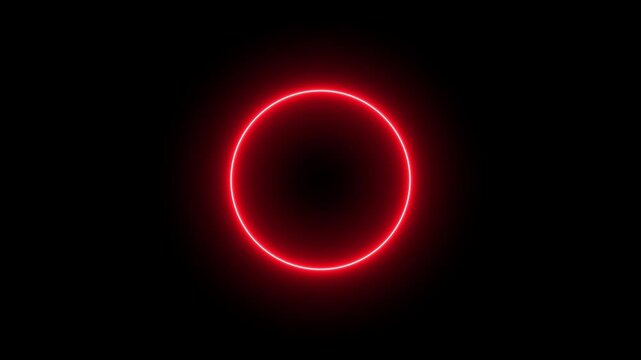 Abstract neon circle animation rotating and glowing against a dark background with futuristic digital. Bright vibrant plasma ring motion graphics.
