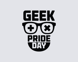 Geek Pride Day with glasses, controller icons, d-pad, A/B buttons graphic on light background © Zander