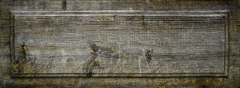 Horizontal weathered wood plaque with frame border. Rustic wooden sign background.