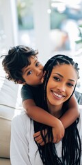 Obraz premium Woman with son hugging from behind while smiling indoors