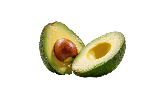 Ripe halved avocado with large seed and vibrant green flesh