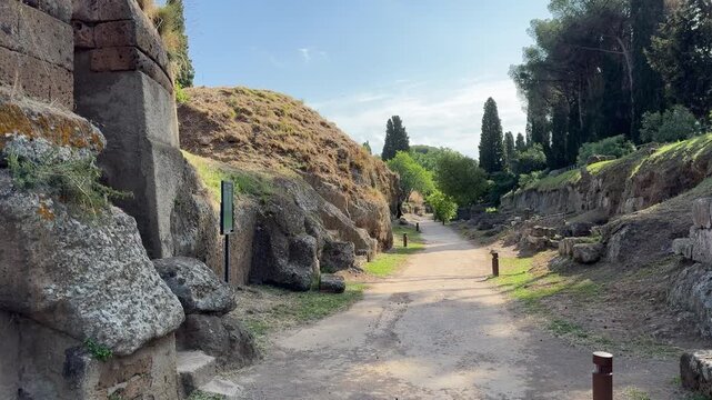Path and Vegetation Near Flat Shaped Etruscan Tombs