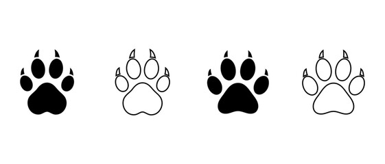 Fototapeta premium Four black paw prints a study in animal footprints and track identification
