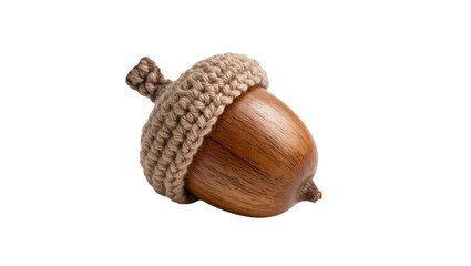 Knitted brown acorn cap atop a smooth brown nut © Rowan