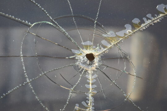 Broken glass from a gun bullet