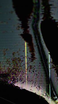 Vertical video. Color distortion. Digital screen. Blue pink yellow artifacts liquid wave futuristic glitch broken pixel drip on dark black art abstract background.