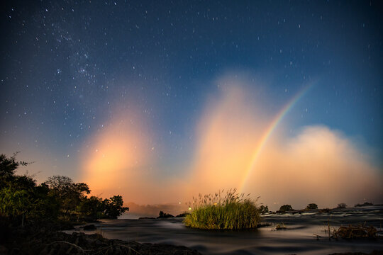 Lunar Rainbow Moonbow Over Victoria Falls at Night, Zambia &mdash; Long Exposure Astrophotography with Stars, River and Mist in African Wilderness