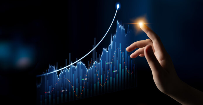 A close-up of a hand reaching toward a glowing data visualization, showcasing an upward trend in graphs and metrics, emphasizing growth in business analytics. Scalp