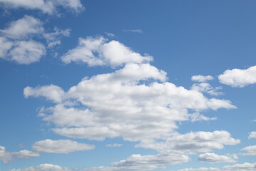 Naklejka premium The sky is the color of milk in spring. Spring clouds.