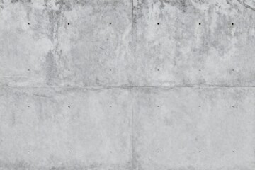 Fototapeta premium Texture of gray concrete wall with a few small holes creates a sense of history