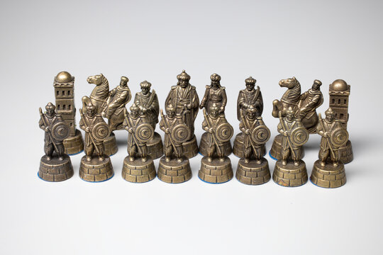 Bronze chess pieces depicting historical mamluk warriors