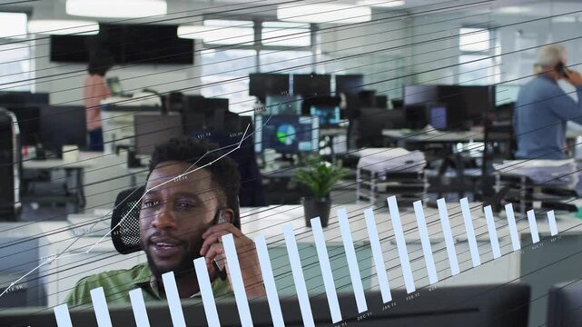 Seated man speaking on phone in business, tracking live metrics, chart growing and obscuring desk