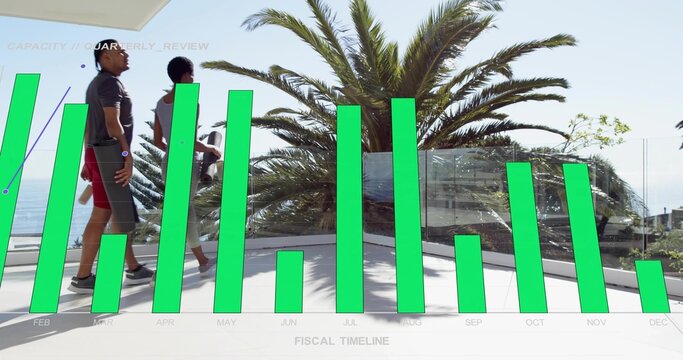 Walking fit couple crossing sea terrace with glass rail, palm tree, green chart overlay, copy space