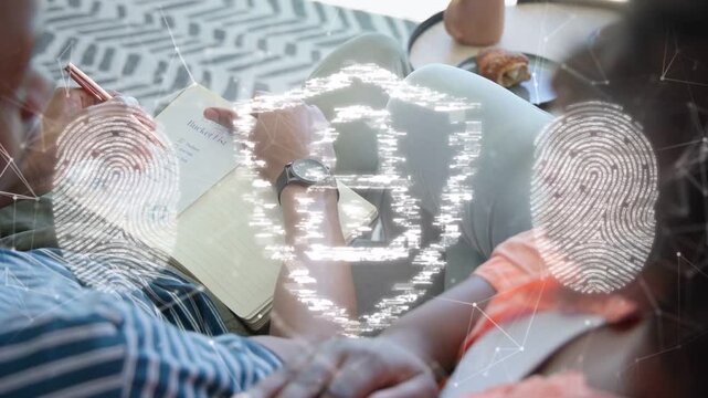 Man and woman reading booklet on sofa, glitch forming security shield overlay obscuring pages