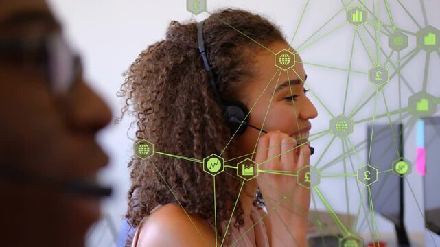 Vertical video: Call center agent adjusting mic and activating green net overlay, speaking, typing