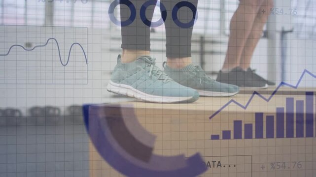 Fitness partners with teal shoes initiating box jumps by bending knees, overlays collecting data